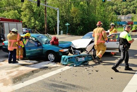 firefighters responding to a serious car accident